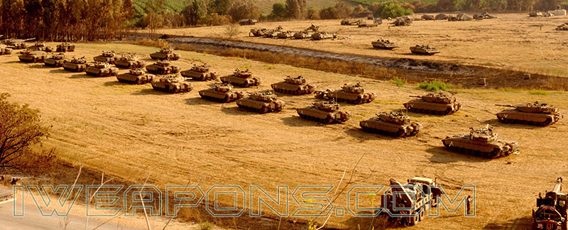 Merkava tanks with 2 trucks carrying power pack