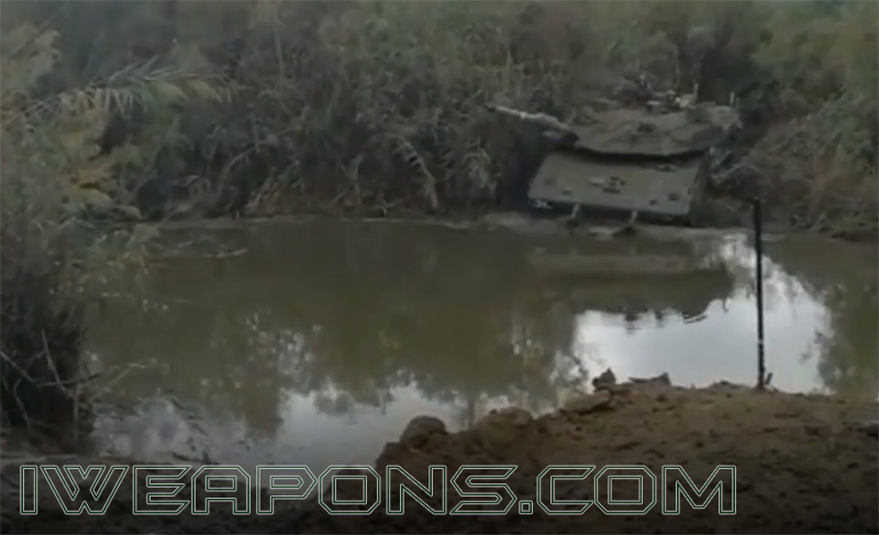 Merkava tank crossing a water barrier